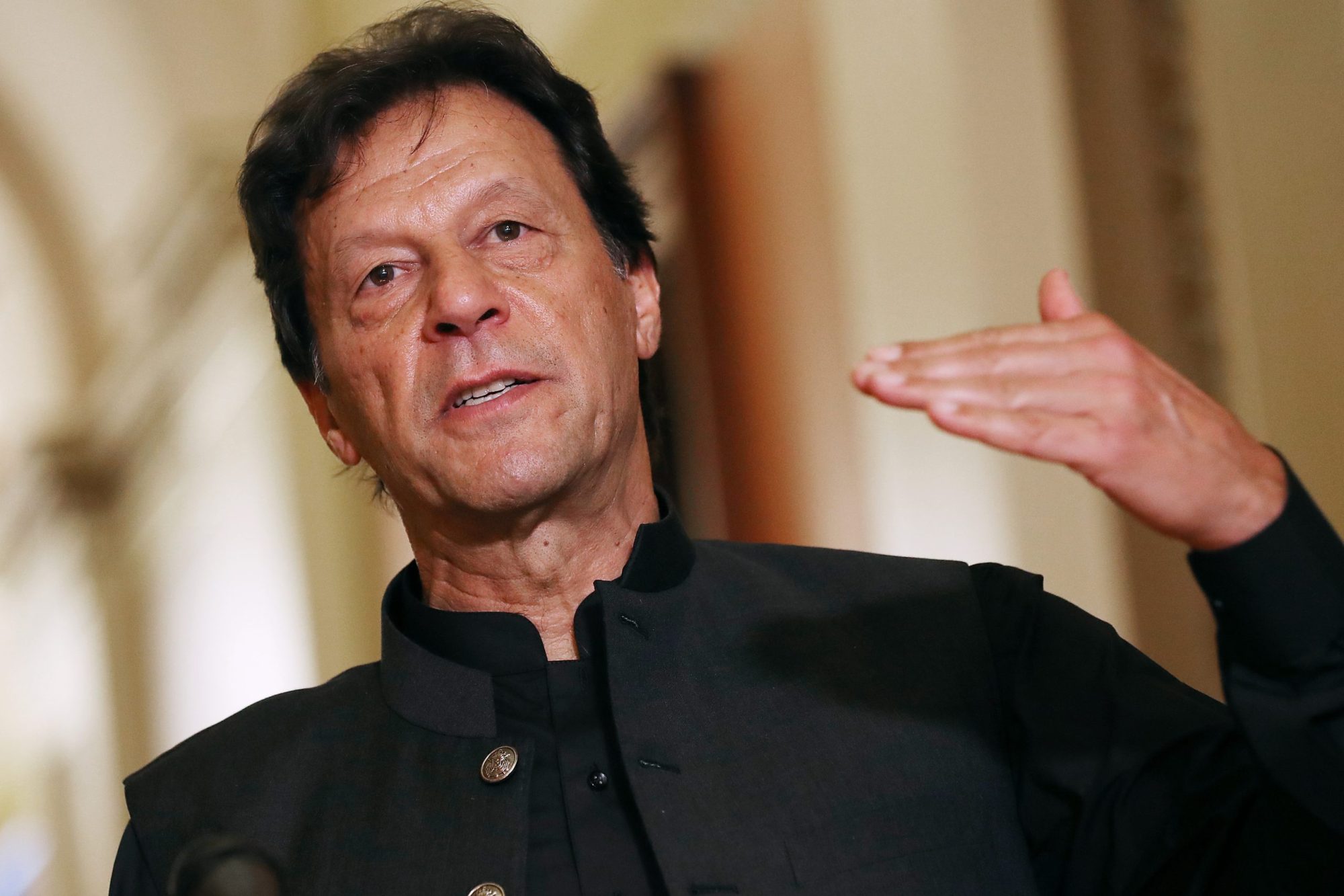 Pakistan Prime Minister Imran Khan makes a brief statement to reporters before a meeting with U.S. House Speaker Nancy Pelosi (D-CA) at the U.S. Capitol July 23, 2019 in Washington, DC. Photo by Chip Somodevilla/Getty Images