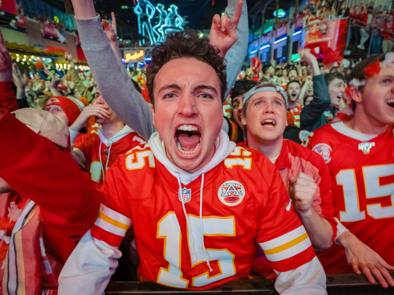 A Chiefs fan screams in excitement at the Power and Light District as the Kansas City Chiefs take the lead against the San Francisco 49ers in the Super Bowl on February 2, 2020 in Kansas City, Kansas. Photo by Kyle Rivas/Getty Images