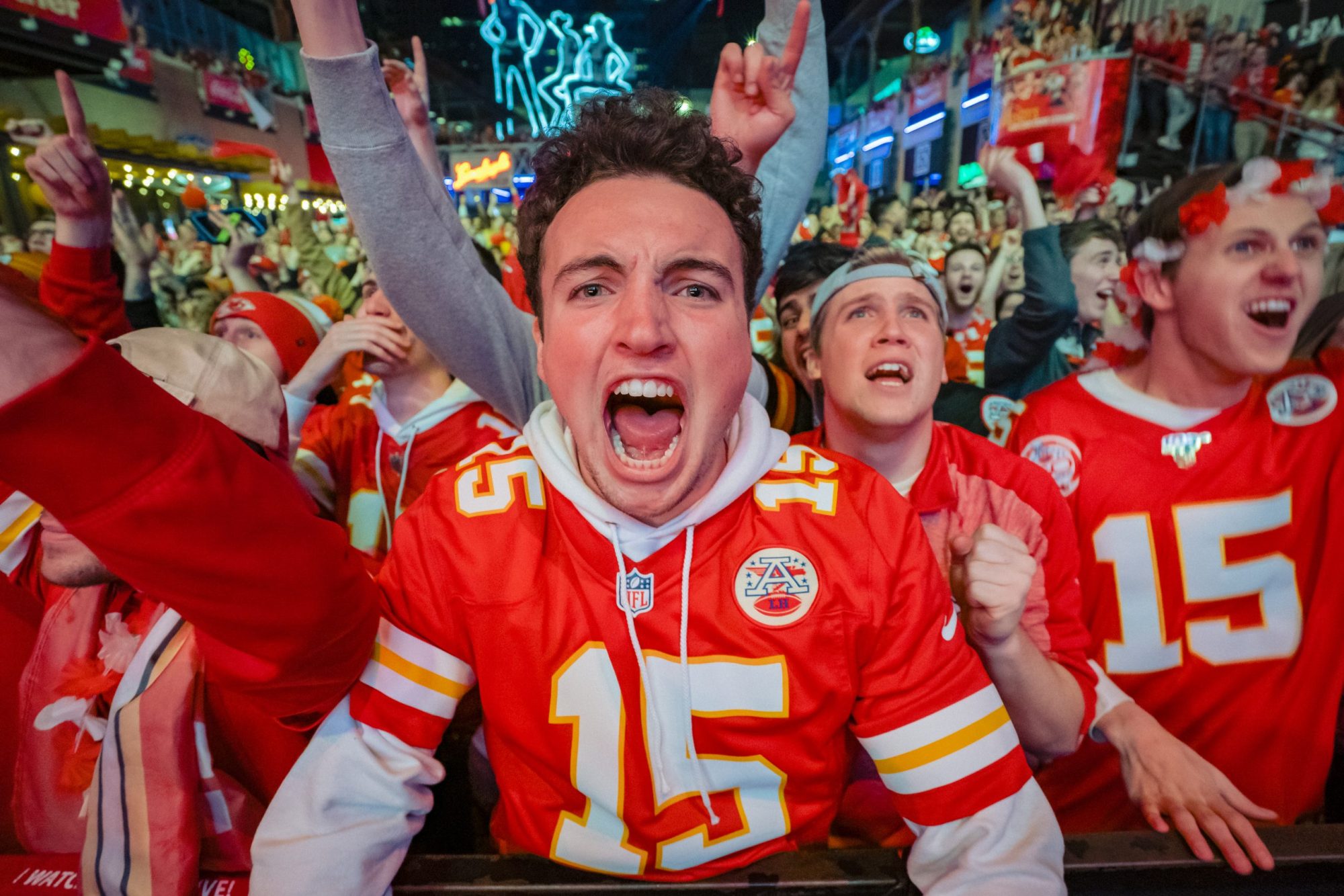 A Chiefs fan screams in excitement at the Power and Light District as the Kansas City Chiefs take the lead against the San Francisco 49ers in the Super Bowl on February 2, 2020 in Kansas City, Kansas. Photo by Kyle Rivas/Getty Images