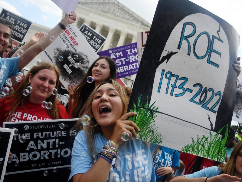 Anti-abortion campaigners celebrate outside the US Supreme Court in Washington, DC, on June 24, 2022.