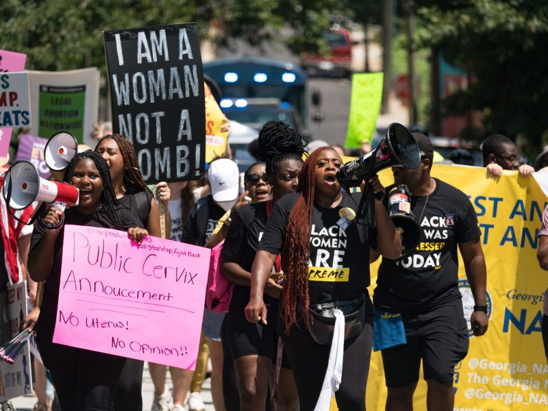 Protestors march and chant in downtown Atlanta in opposition to Georgia's new abortion law on July 23, 2022.