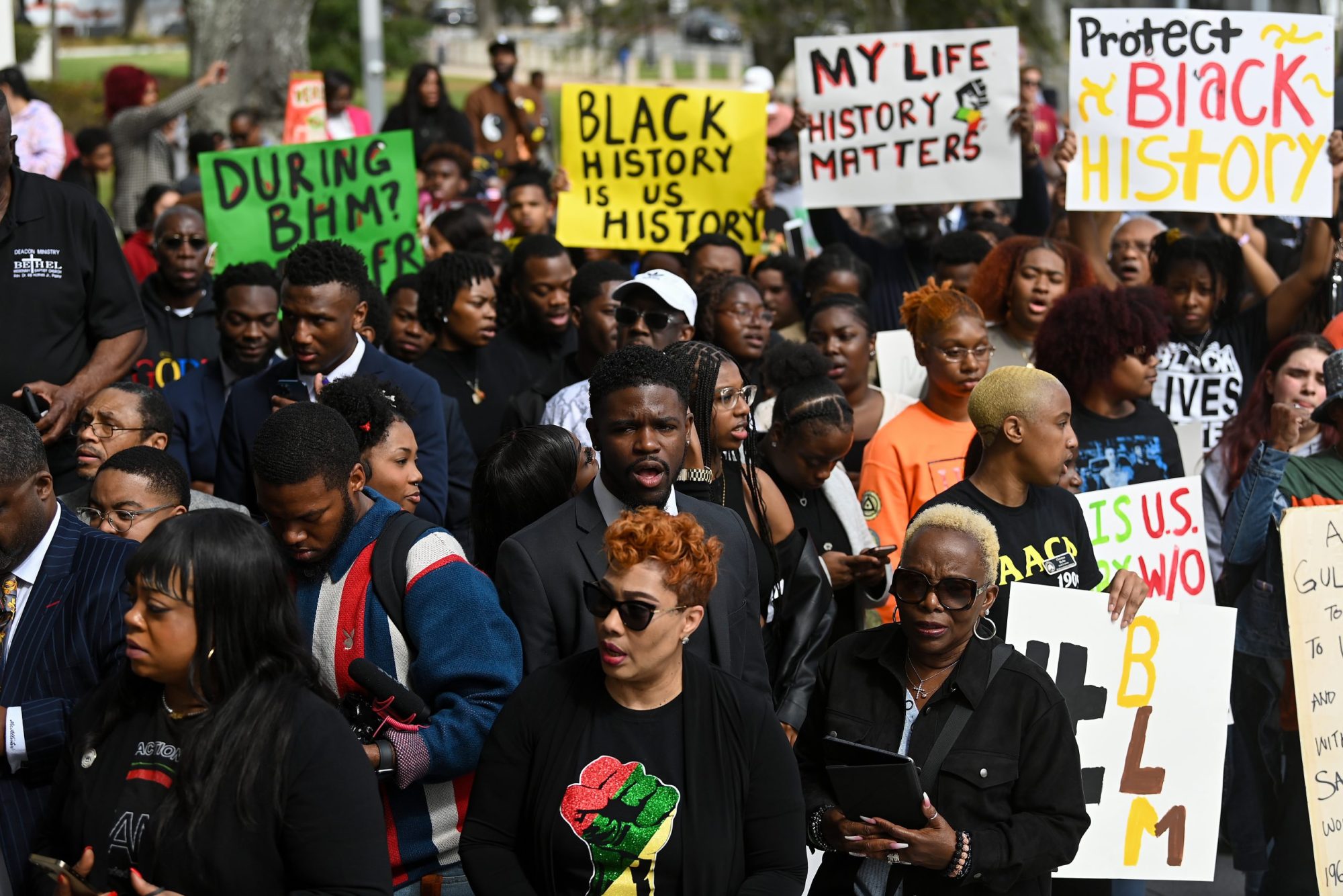 Demonstrators protest Florida Governor Ron DeSantis plan to eliminate Advanced Placement courses on African American studies in high schools as they stand outside the Florida State Capitol on February 15, 2023, in Tallahassee, Florida.