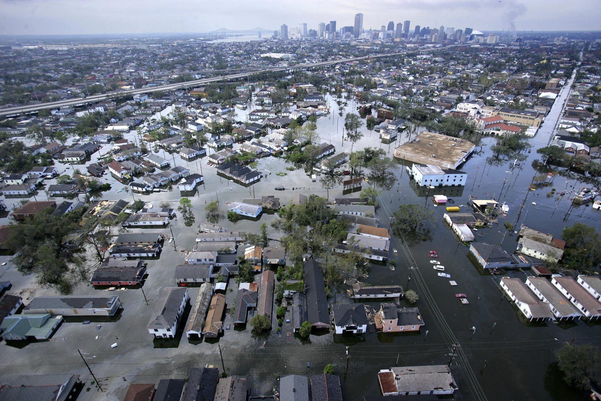 Flood waters from Hurricane Katrina cover streets 30 August, 2005 in New Orleans, Louisiana. Photo by POOL/POOL/AFP via Getty Images