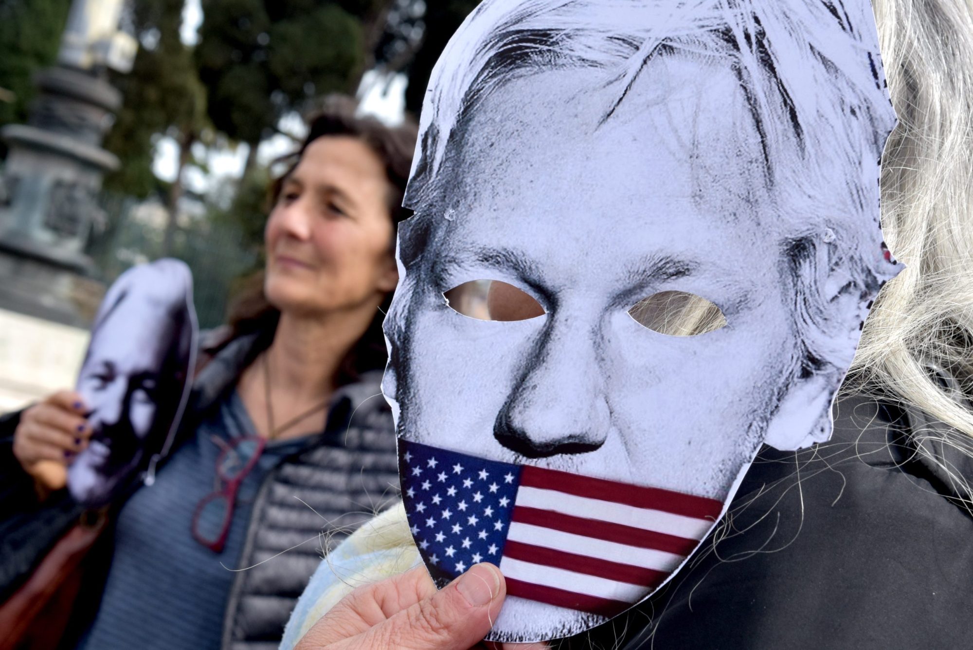 People protest in Piazza della Repubblica to demand the freedom of Julian Assange, with banners, placards and silhouettes depicting the journalists in prison, on April 11, 2023 in Rome, Italy. Photo by Simona Granati - Corbis/Corbis via Getty Images