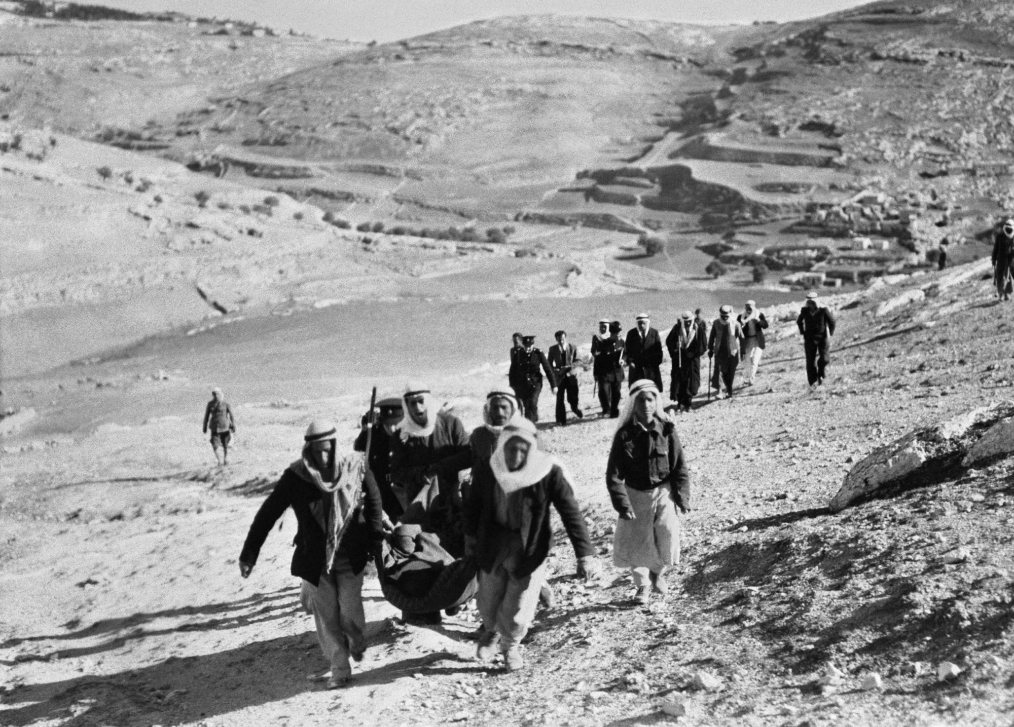 Picture released in January 1948 shows Palestinian Arabs leaving their village and neighborhoods of Jerusalem to march against a Jewish settlement in Palestine and fleeing the Haganah attack, during the 1948 ArabIsraeli War. Photo by -/INTERCONTINENTALE/AFP via Getty Images