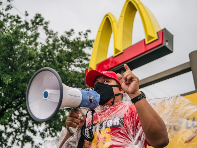 Armando Tax, an organizer for Fight For $15, speaks during a rally on May 19, 2021, in Houston, Texas.