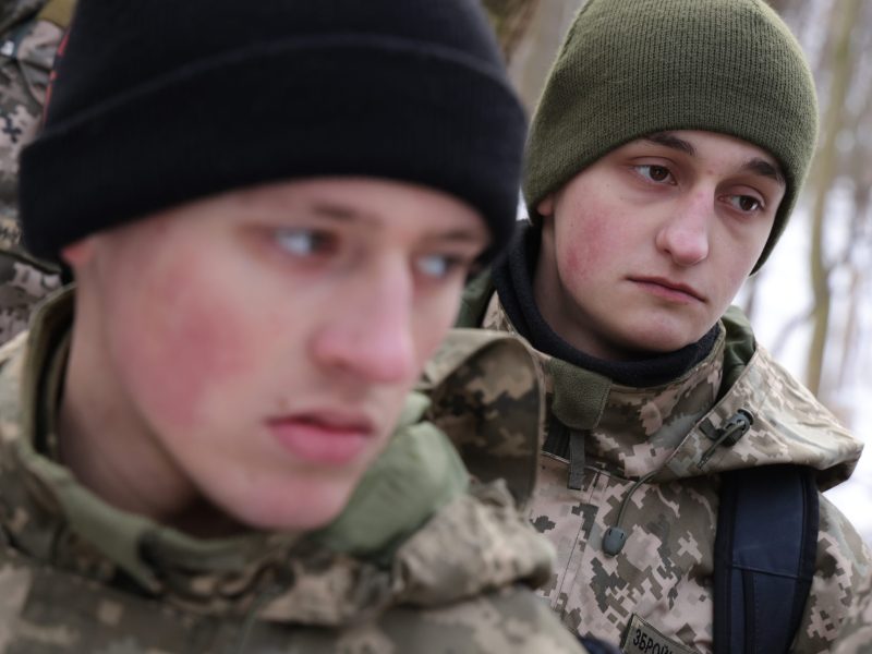 Two civilian participants in a Kyiv Territorial Defence unit
