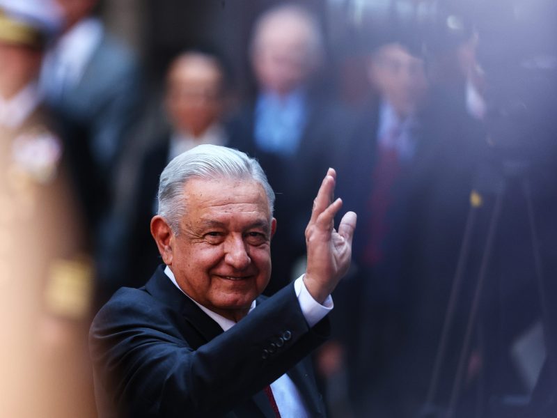 Andres Manuel Lopez Obrador, President of Mexico waves during the signing of a memorandum of understanding Between Mexico and Canada as part of the '2023 North American Leaders' Summit at Palacio Nacional on January 11, 2023 in Mexico City, Mexico. Photo by Manuel Velasquez/Getty Images