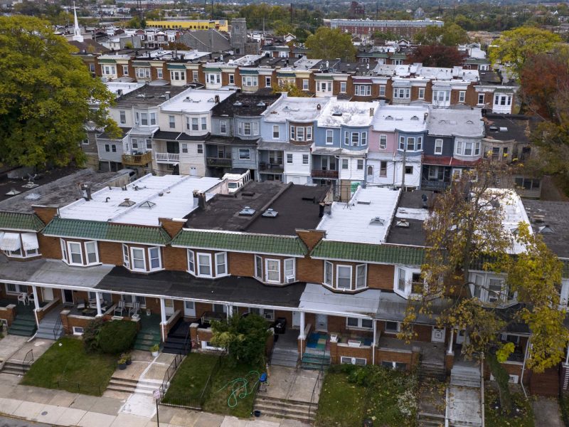 Aerial view of rows of brightly covered row houses of Northern Baltimore. Photo by: Visions of America/Joseph Sohm/Universal Images Group via Getty Images.