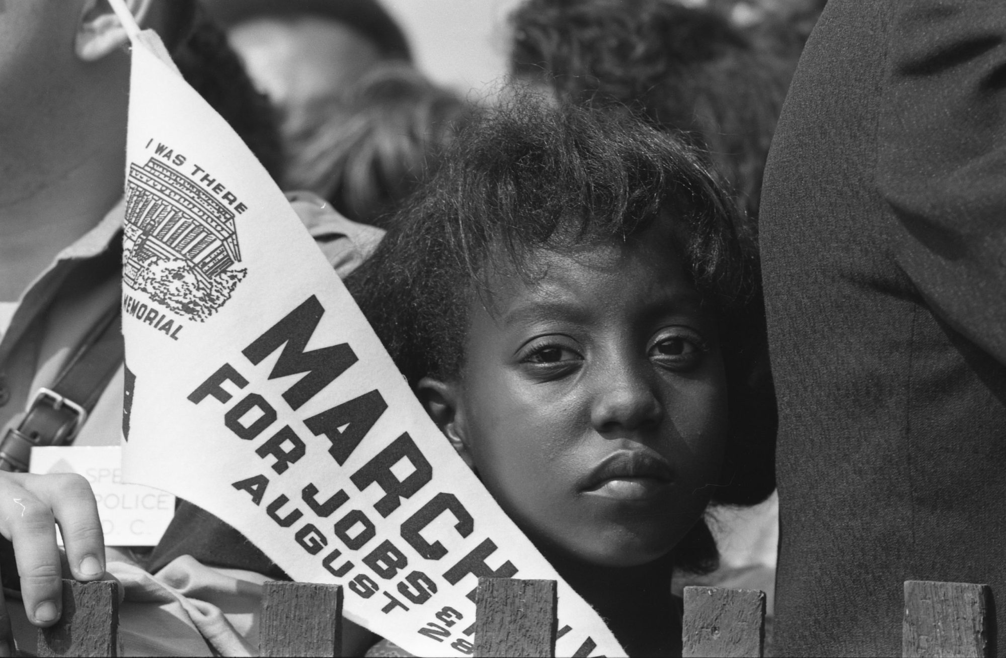 Close-up of Edith Lee Payne of Detroit, a young marcher participating in the March for Jobs and Freedom to the Lincoln Memorial in Washington DC, August 28, 1963. Photo by Rowland Scherman/Getty Images