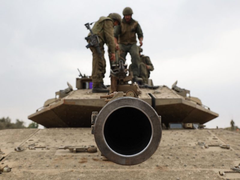 Israeli army soldiers are positioned with their Merkava tanks near the border with the Gaza Strip in southern Israel on October 9, 2023.Photo by JACK GUEZ/AFP via Getty Images