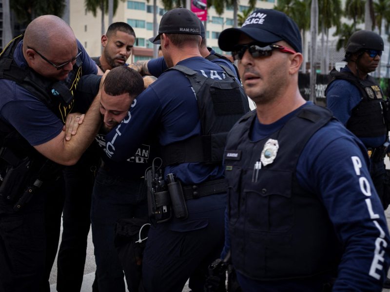 Miami police officers detain a demonstrator as people attend a rally in support of Palestinians in the Gaza Strip at Bayfront Park in Miami, Florida, on October 13, 2023. Photo by MARCO BELLO/AFP via Getty Images
