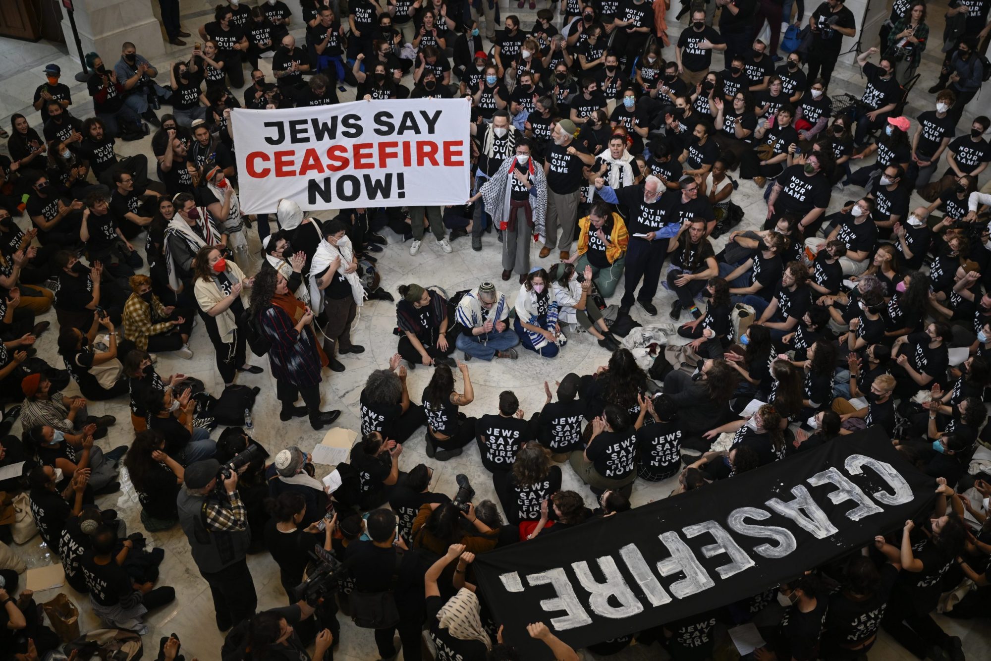 Police officers take a protester into custody as Jewish activists stage pro-Palestinian demonstration at United States Capitol building in Washington D.C., United States on October 18, 2023. Photo by Celal Gunes/Anadolu via Getty Images