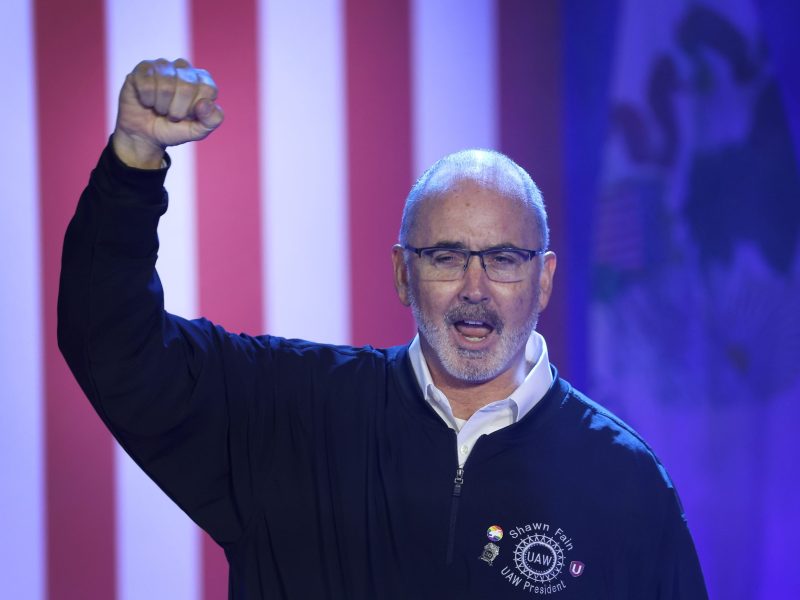 United Auto Workers (UAW) President Shawn Fain speaks to auto workers before the arrival of President Joe Biden at the Community Complex Building on November 9, 2023, in Belvidere, Illinois. Biden was in Belvidere to celebrate the scheduled reopening of Stellantis' Belvidere Assembly Plant and the settlement of the United Auto Workers (UAW) strike.