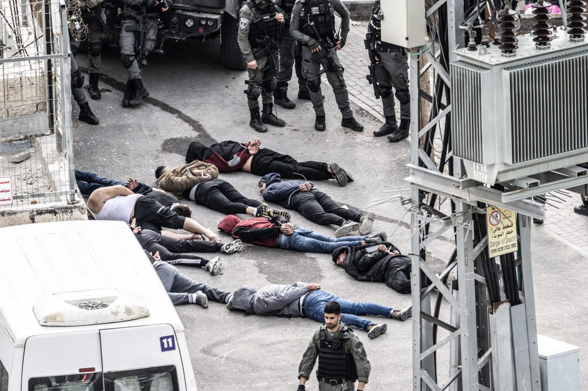 Israeli forces detain Palestinians protesting against the demolition of a building belonging to Palestinians, which they claimed as unlicensed at Jabel Mukaber Neighborhood in East Jerusalem on January 03, 2024. Photo by Mostafa Alkharouf/Anadolu via Getty Images