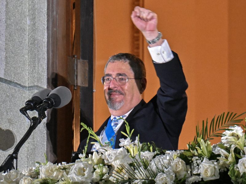 Guatemala's new President Bernardo Arevalo gestures at supporters from a balcony of the Culture National Palace in Guatemala City, after his inauguration ceremony, early on January 15, 2024. Photo by JOHAN ORDONEZ/AFP via Getty Images