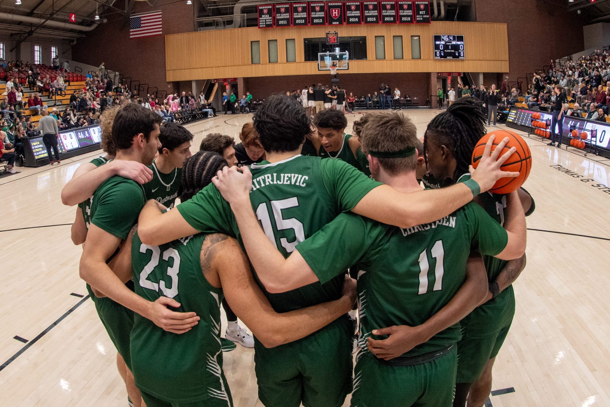 Dartmouth Big Green players huddle as a team before the college basketball game between the Dartmouth Big Green and the Harvard Crimson on February 10, 2024, at Lavietes Pavilion in Allston, MA. Photo by Erica Denhoff/Icon Sportswire via Getty Images