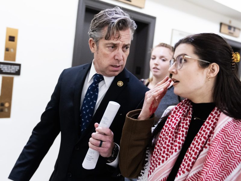 Rep. Andy Ogles, R-Tenn., is questioned by a pro-Palestinian activist in Longworth Building on Thursday, February 15, 2024. Tom Williams/CQ-Roll Call, Inc via Getty Images