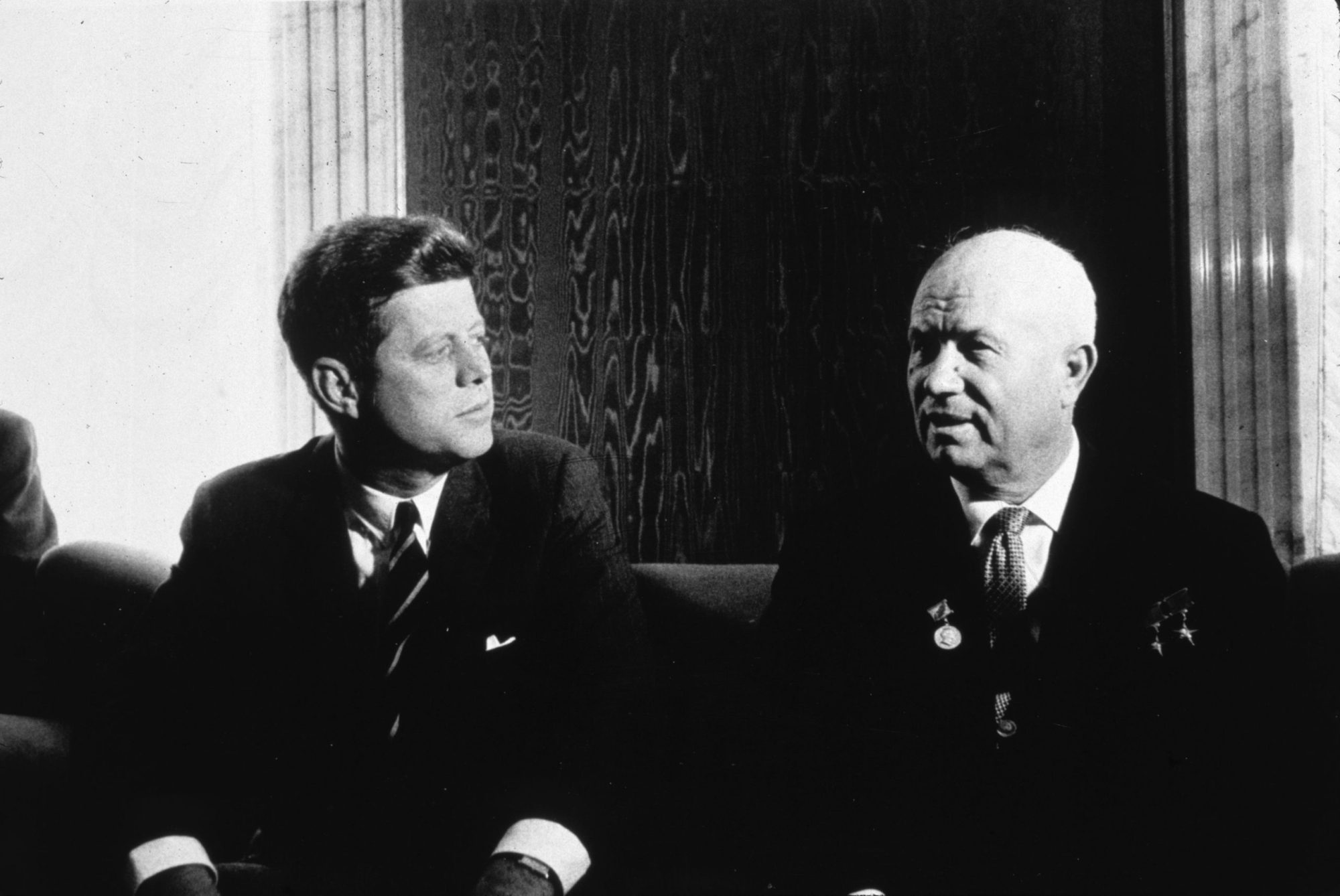 US President John Kennedy talks with Russian Soviet leader, Nikita Khrushchev. Photo by MPI/Getty Images