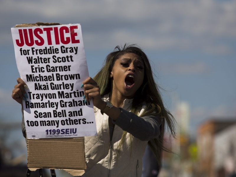 Baltimore resident Caira Byrd protests during the wake of Freddie Gray