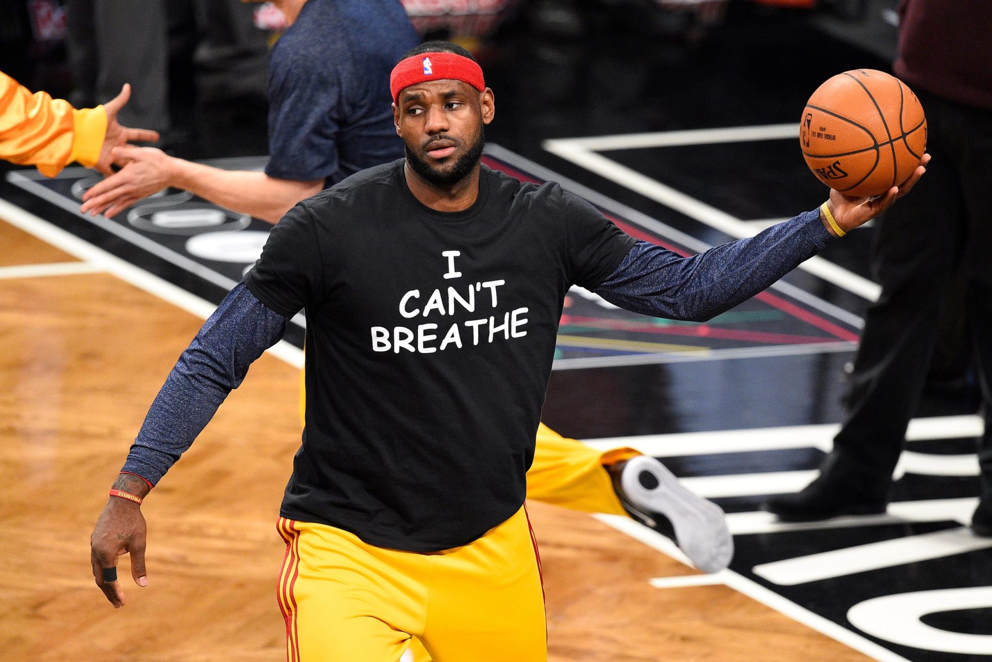 Cleveland Cavaliers forward LeBron James (23) wears a t shirt to honor Eric Garner during warmups before a NBA game between the Cleveland Cavaliers and the Brooklyn Nets at Barclays Center in Brooklyn, NY. Photo by Rich Kane/Icon Sportswire/Corbis/Icon Sportswire via Getty Images
