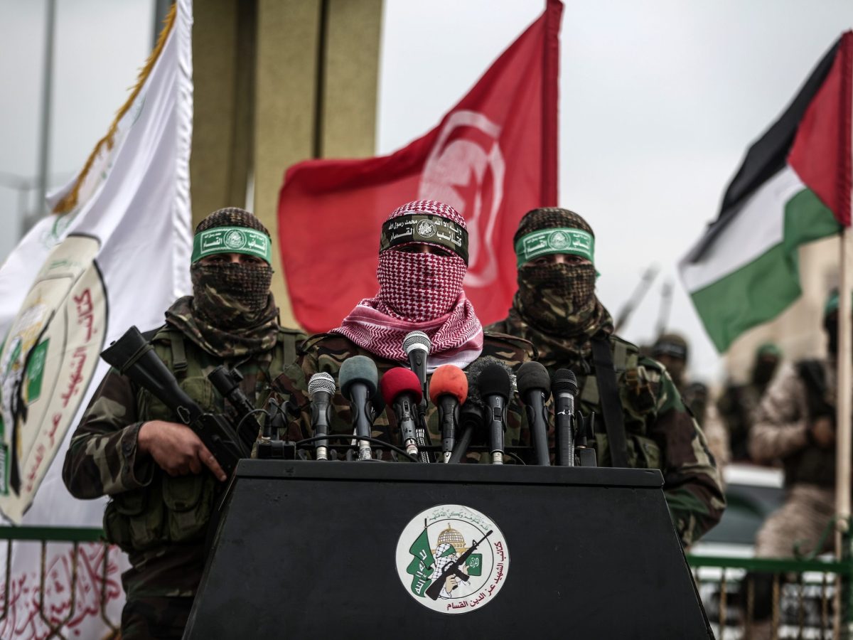 The armed branch of Hamas, Izz ad-Din al-Qassam Brigades spokesman, Abu Obeida speaks during the opening ceremony of the monument for assassinated Tunisian aircraft engineer Muhammed ez-Zevvari, by Izz ad-Din al-Qassam Brigades in Rafah, Gaza on January 31, 2017. Photo by Ali Jadallah/Anadolu Agency/Getty Images