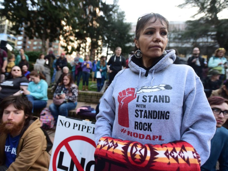 Millie Wahl stands in solidarity with the "Native Nations Rise" march on Washington, DC, against the construction of the Dakota Access Pipeline in Portland, Oregon, on March 10, 2017.