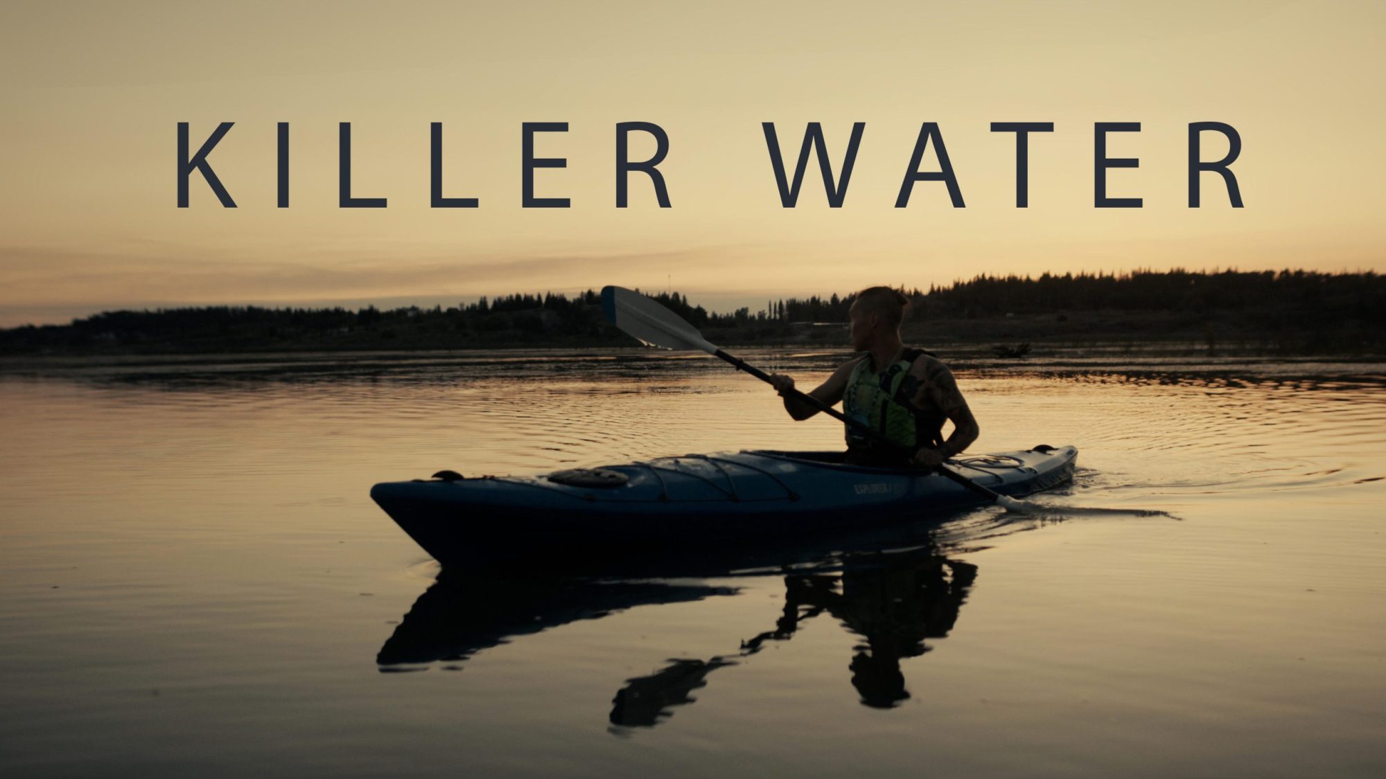 Movie poster for "Killer Water" featuring a photo of Mikisew Cree member Calvin Waquan paddling on a kayak near Lake Athabasca at dusk with the words "Killer Water" above him. Poster/image by Geordie Day.