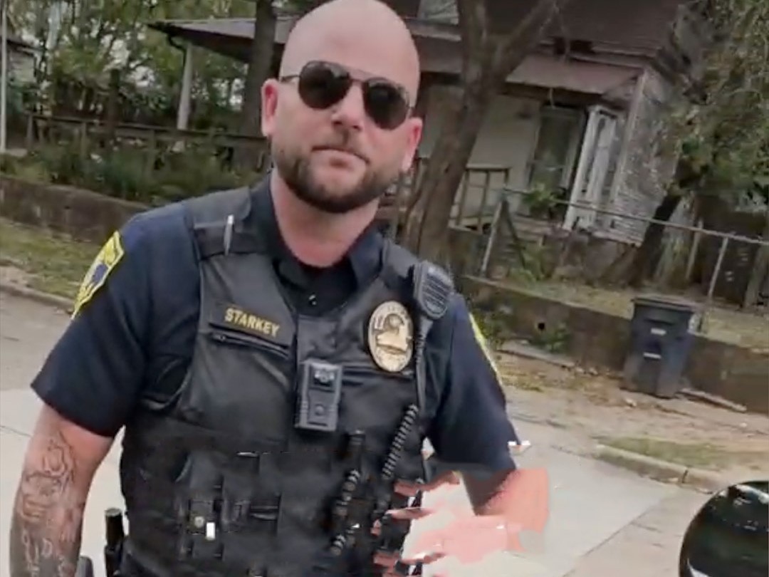 Shawnee, Oklahoma, police officer Anthony Starkey approaches resident for not walking on a sidewalk.