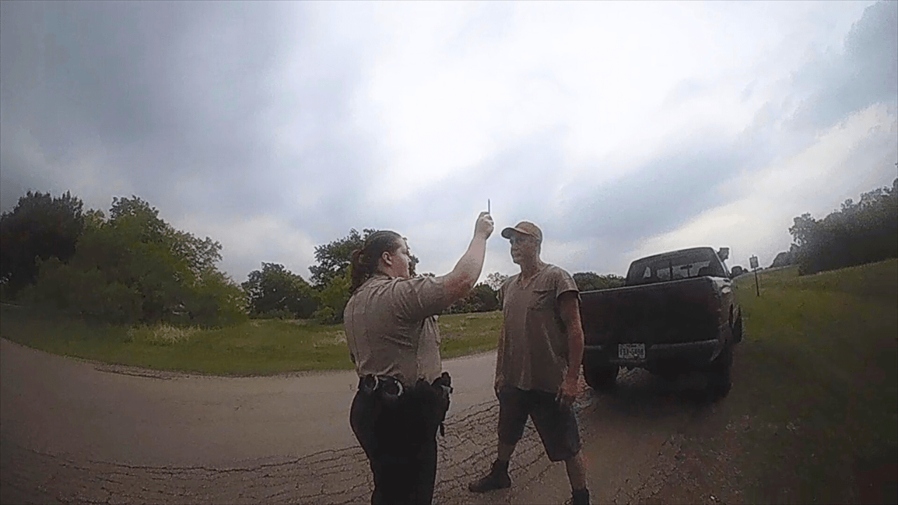 Body camera still of Denton County, Texas sheriffs arresting "Thomas," a former firefighter. The footage of Thomas's arrest later revealed that sheriffs were aware he was not drunk but arrested him for a DUI anyway.