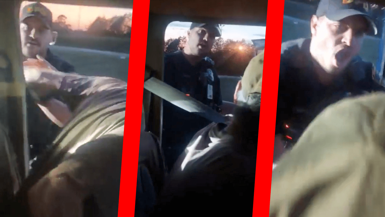 Dennison, Texas police officers grab Robert Clark's arm during a traffic stop. Screenshots taken from footage courtesy of Robert and Julie Clark