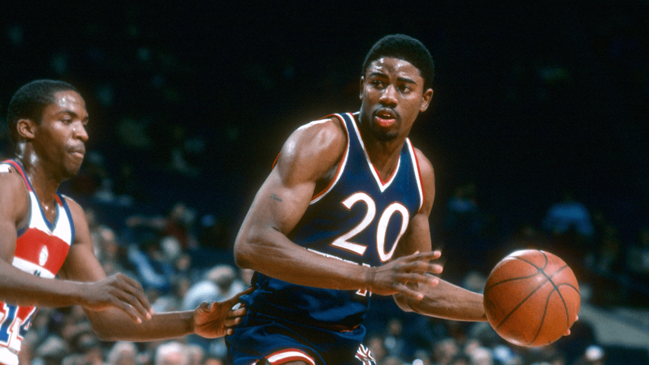 Michael Ray Richardson #20 of the New York Knicks looks to pass the ball against the Washington Bullets during an NBA basketball game circa 1980 at the Capital Centre in Landover, Maryland. Richardson played for the Knicks from 1978-82. Photo by Focus on Sport/Getty Images
