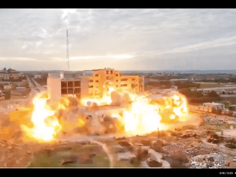 Screenshot from a video showing the destruction of al-Israa University by the Israeli military.